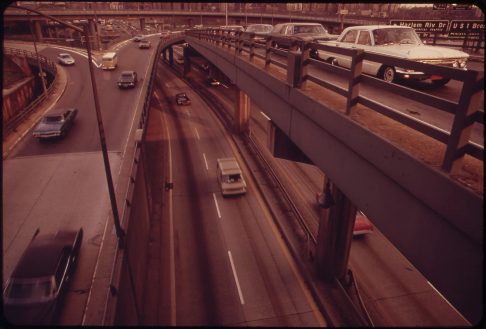 The Cross Bronx Expressway cuts through a dense New York City neighborhood in this 1973 federal Environmental Protection Agency photograph, the kind of large-scale interstate highway project that relied on eminent domain to acquire a continuous right-of-way through existing city blocks.