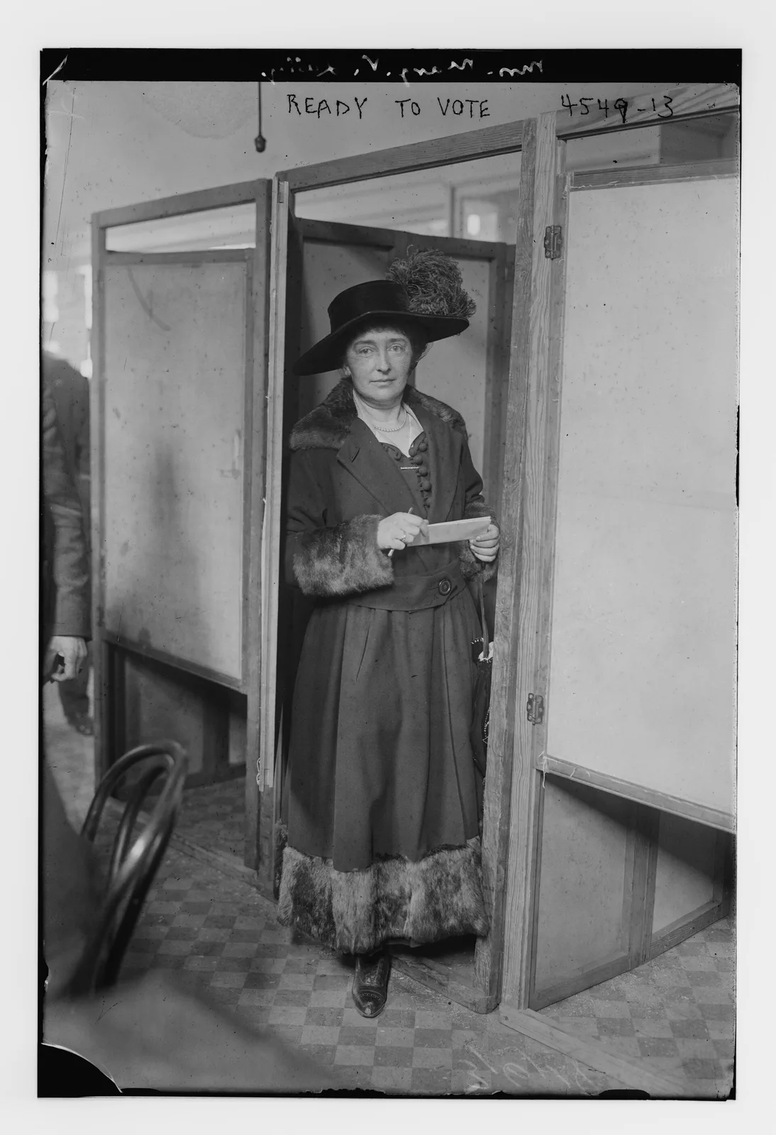 Women standing in line outside a New York City polling place in 1918, waiting to cast ballots in one of the first elections open to them