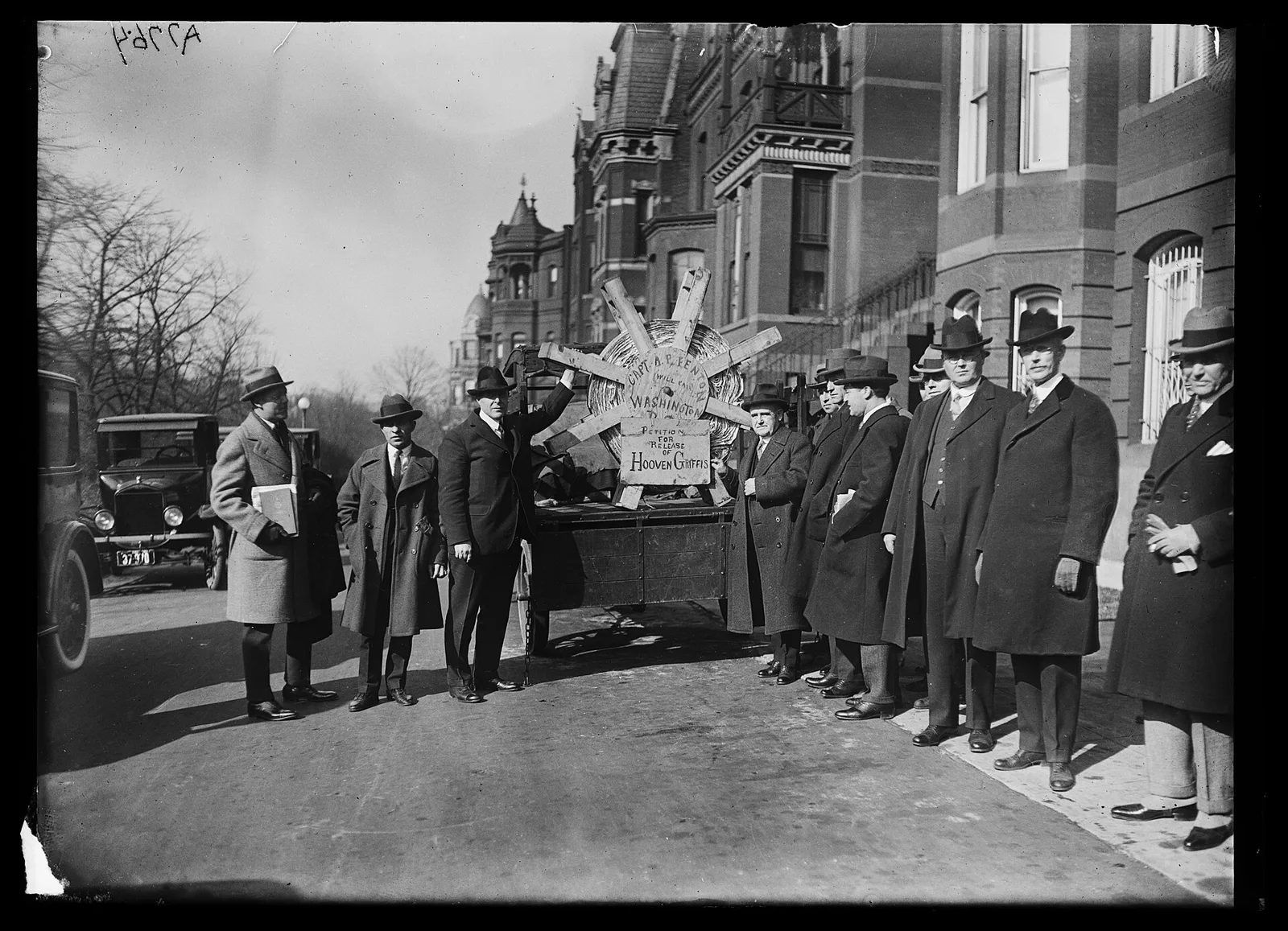Citizens signing a petition, exercising the right to petition the government