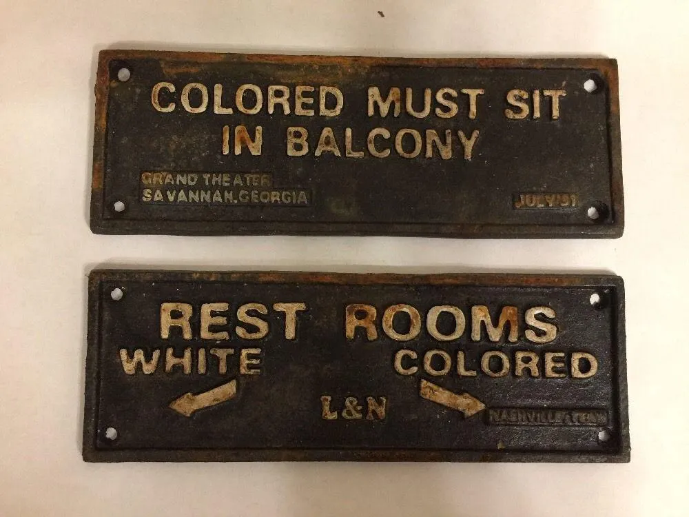 Jim Crow era segregation sign reading 'White Only' on a public facility in the American South