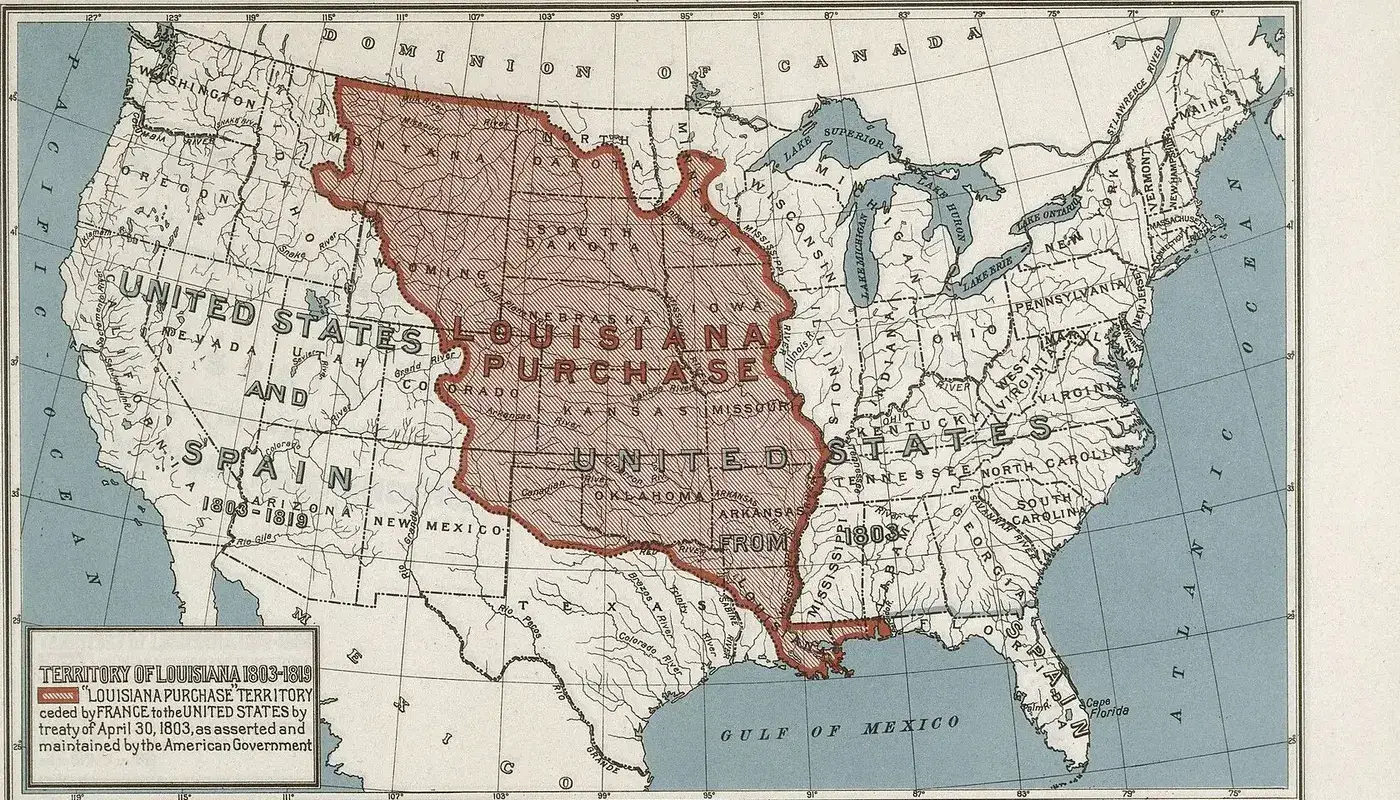 1912 map of the United States with the Louisiana Purchase territory shaded in red, stretching from New Orleans north to Canada and west to the Rocky Mountains