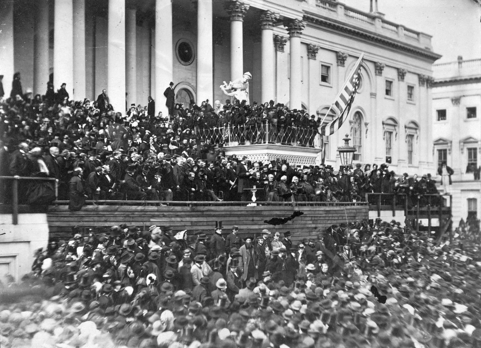 Alexander Gardner photograph of the crowd gathered at the East Front of the unfinished U.S. Capitol as Abraham Lincoln delivers his second inaugural address on March 4, 1865