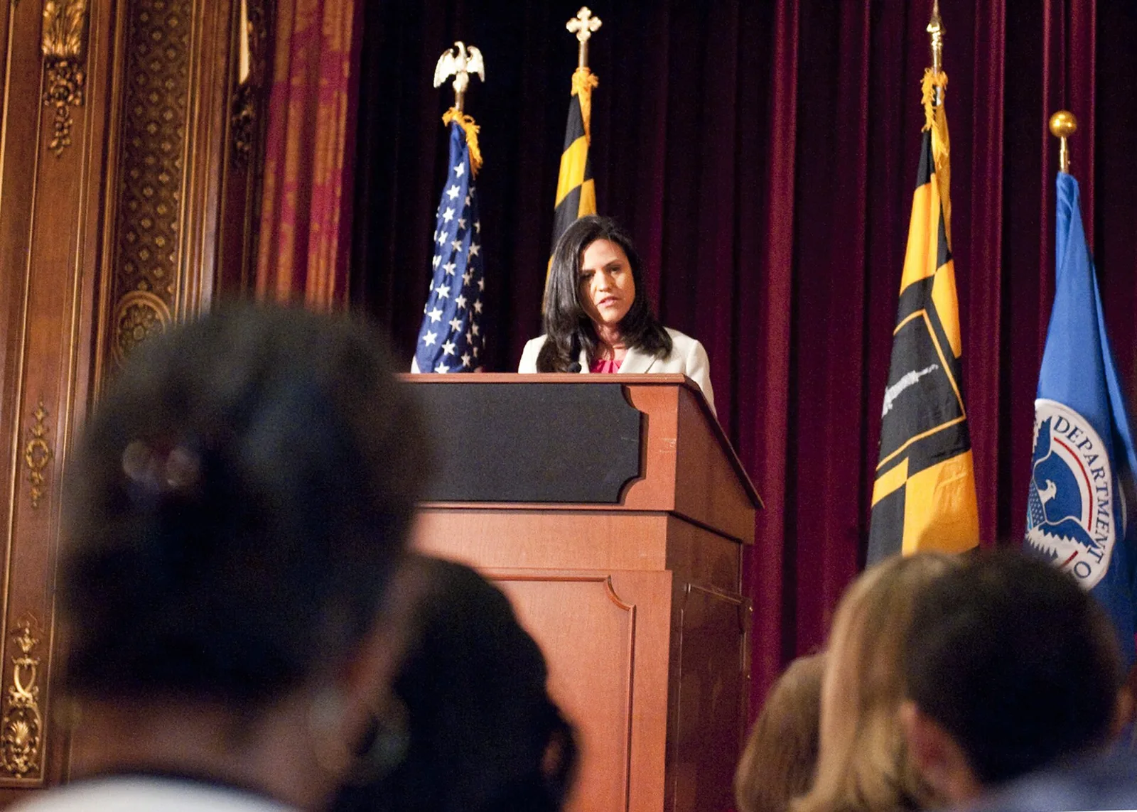 Naturalization ceremony with new citizens taking the oath