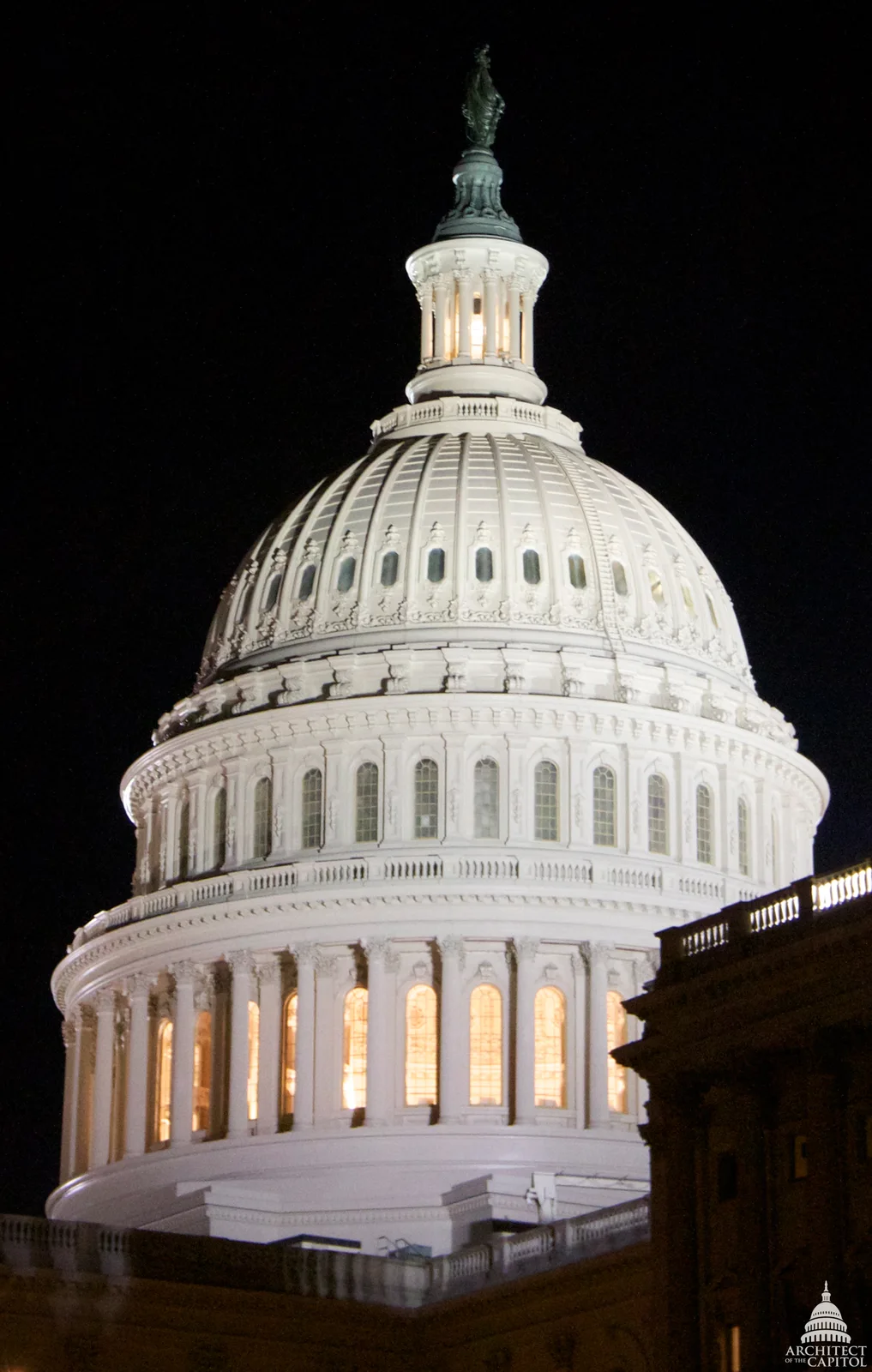 The U.S. Capitol dome illuminated at night