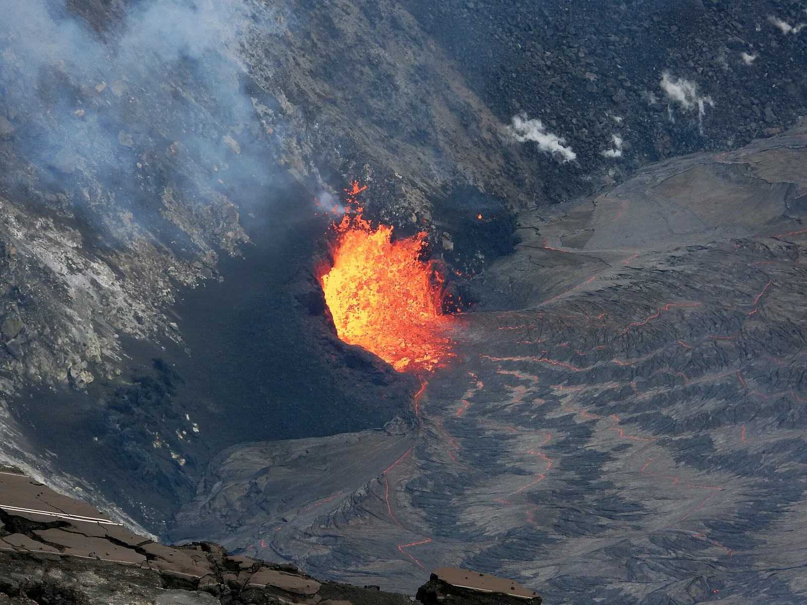 Kilauea crater glowing at night with active lava visible in Halema'uma'u, Hawaii Volcanoes National Park