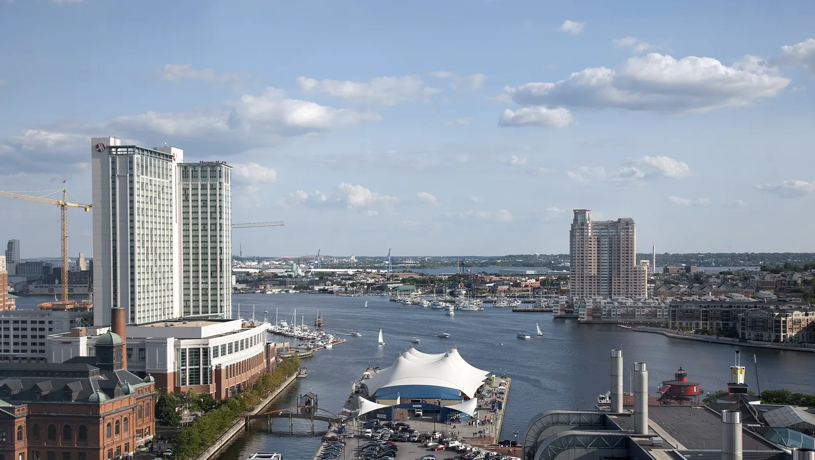 Baltimore's Inner Harbor with the National Aquarium and historic waterfront at dusk